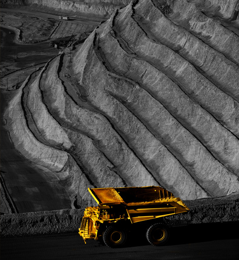 Mining Machinery, yellow dozer in a mine